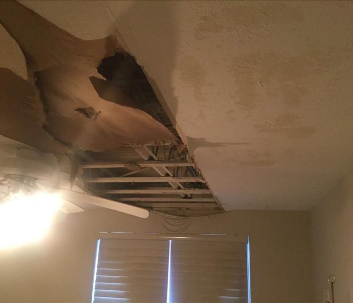 Ceiling falling in due to damage